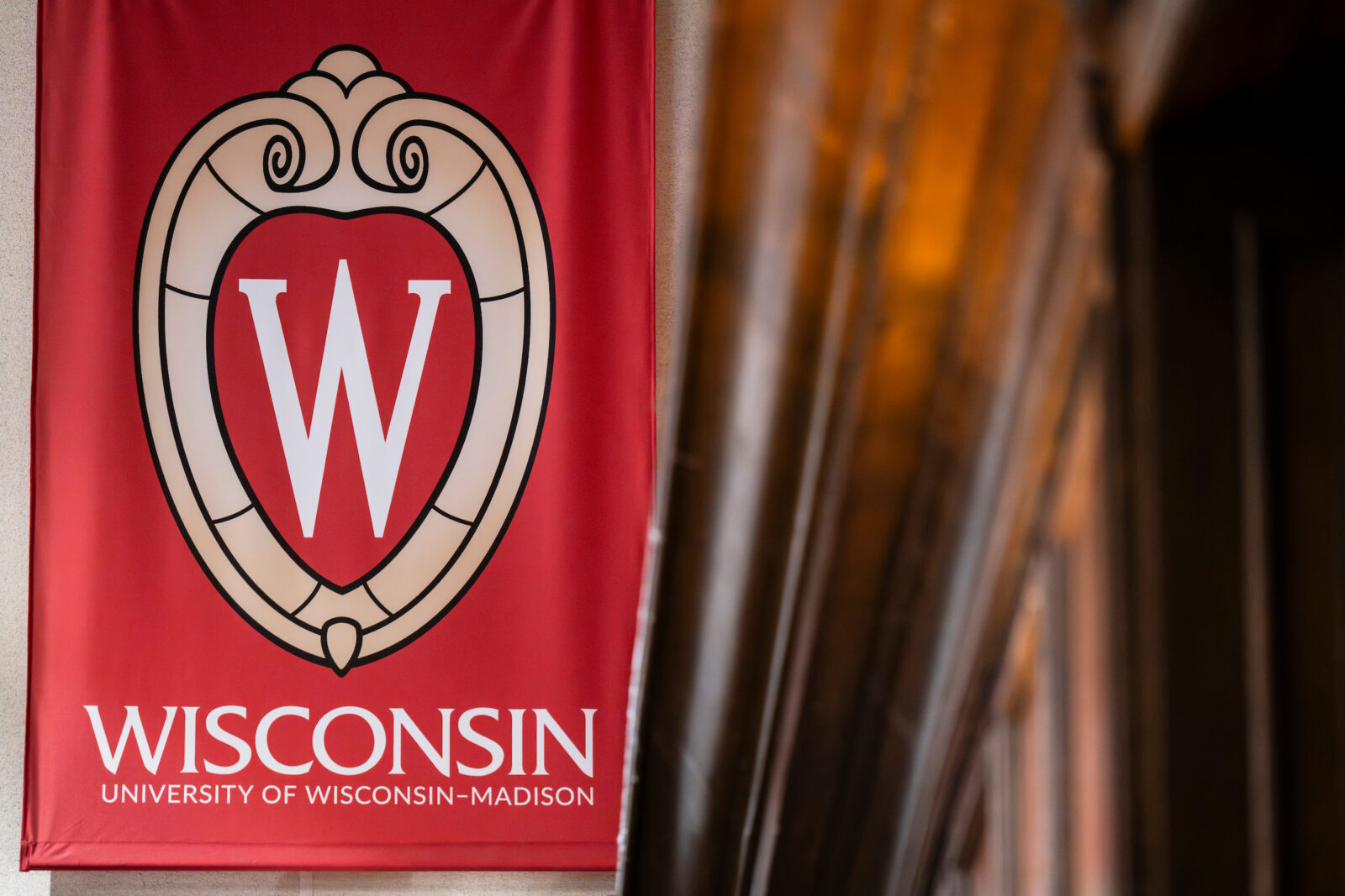A UW banner hangs in Tripp Commons in the Memorial Union hosted by the Wisconsin Union Directorate at the University of Wisconsin–Madison.