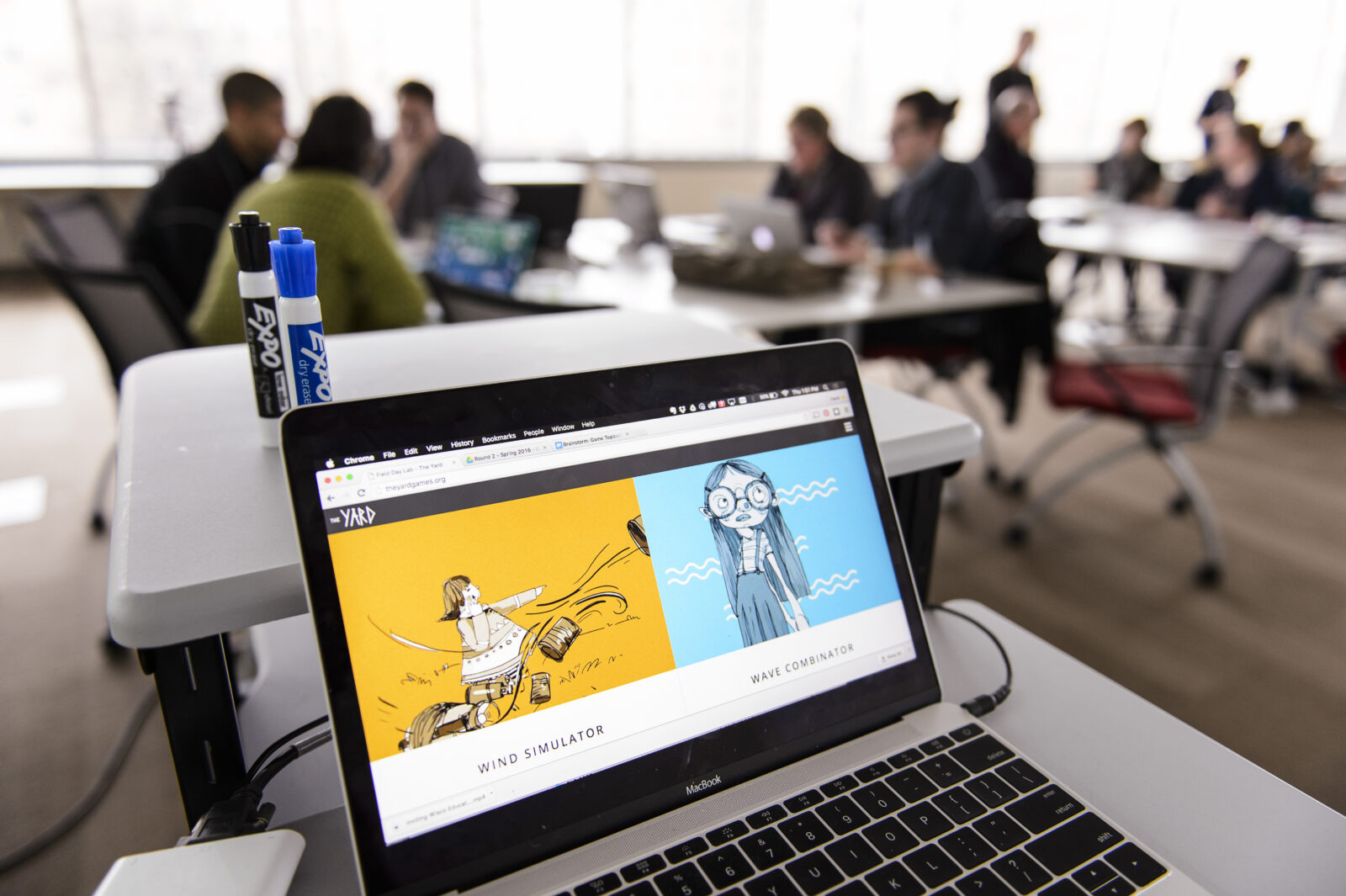 A website is displayed on a laptop computer